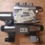 A hidraulikus szeleptömb load sensing (LS) változata a csatlakozók jelölésével